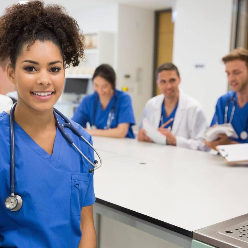 36421965 Medical Student Smiling At The Camera During Class At The University Transformed